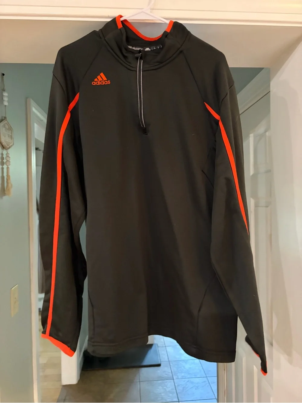 adidas Black Half-Zip Pullover with Bright Orange Accents